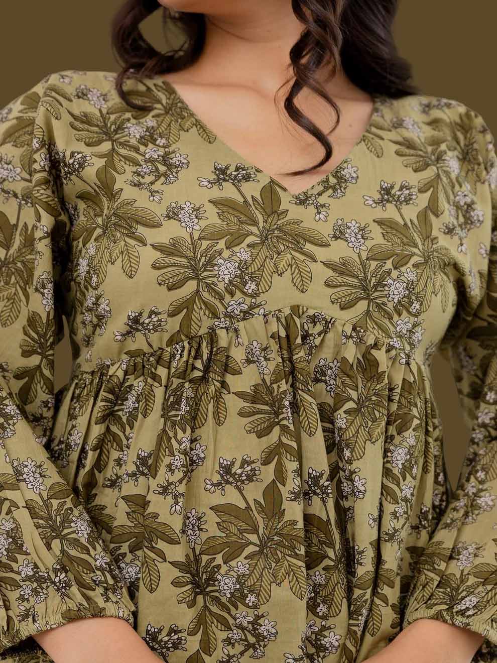 Green Printed V-Neck Peplum Tunic